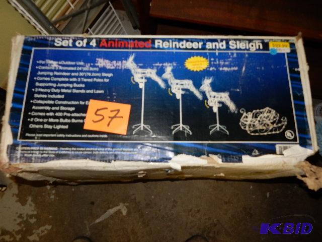 lot 57 image: Set of 4 Animated Reindeer and Sleigh.. Box a...