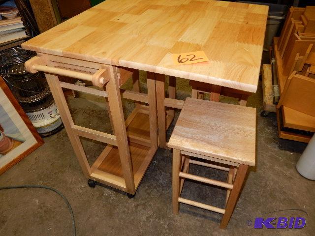 lot 62 image: Self Storing Table and Stools.. Leaf folds do...
