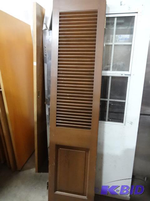 lot 102 image: 36 X 79 Bifold Door. Solid and has Slats...