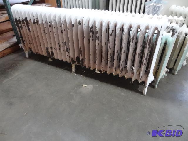 lot 22 image: 27 Fin Cast Iron Radiator 69 X 7 X 28...