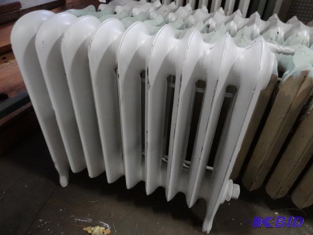 lot 27 image: 9 Fin Cast Iron Radiator 23 X 7 X 22...