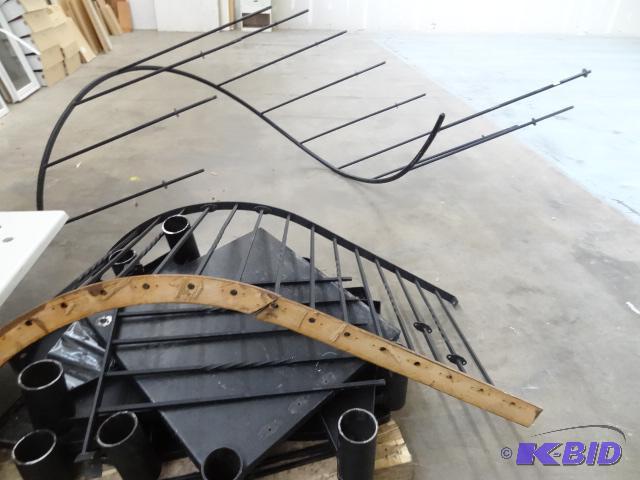 lot 68 image: Rod Iron Spiral Stairs. Looks to be 11 Treads...
