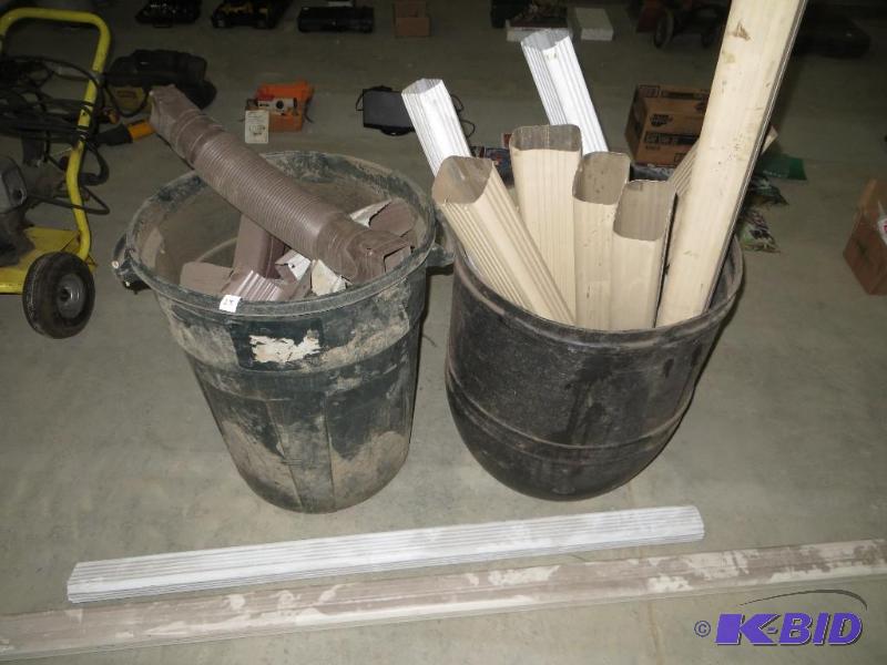 2 Garbage Cans with down spouts...