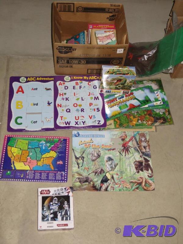 Box of kids puzzles...
