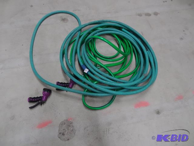 2 Garden Hoses with 2 Spray Nozzles...