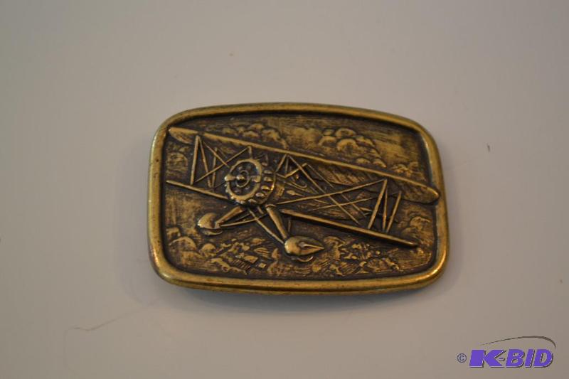 lot 48 image: Airplane belt buckle...
