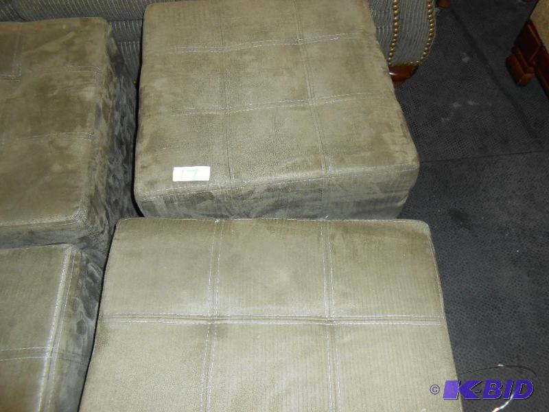 2 small green microfiber ottamans