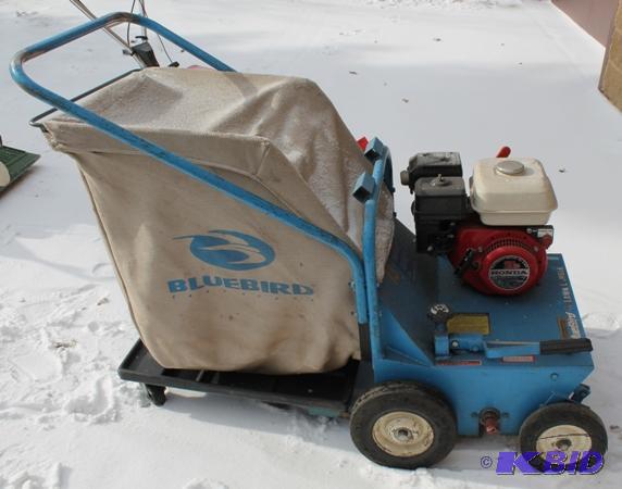 lot 15 image: Blue Bird Power Raker  Model # 400 Dimen...