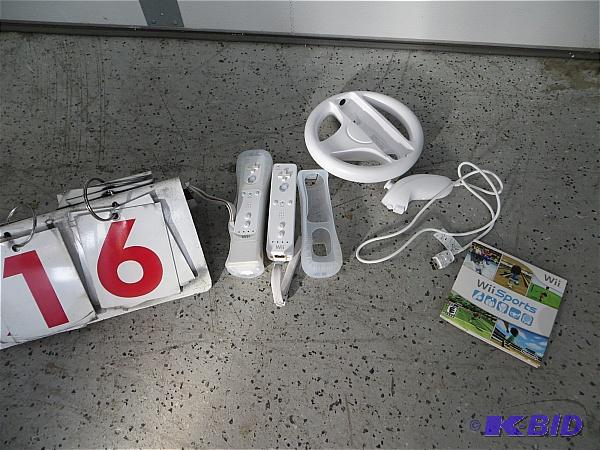 lot 16 image: Lot of Wii controllers and one game...