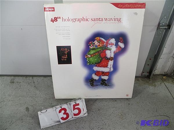 lot 35 image: 48" Holographic Santa Waving Yard Decora...