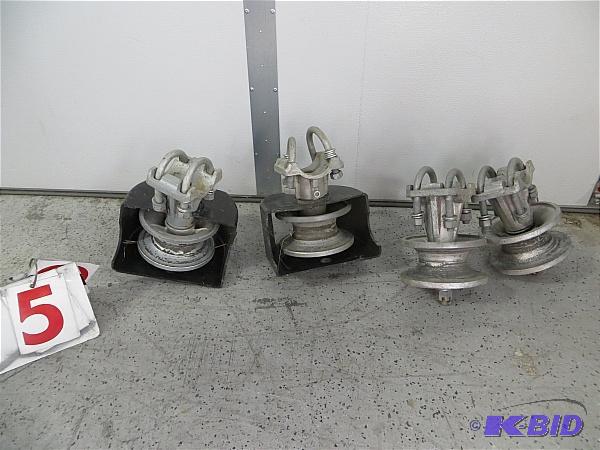 lot 5 image: Fence Rollers. Set of 4 - 5 inch pole rollers...
