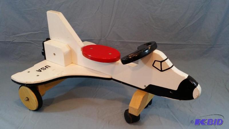 Childrens push around Space Shuttle