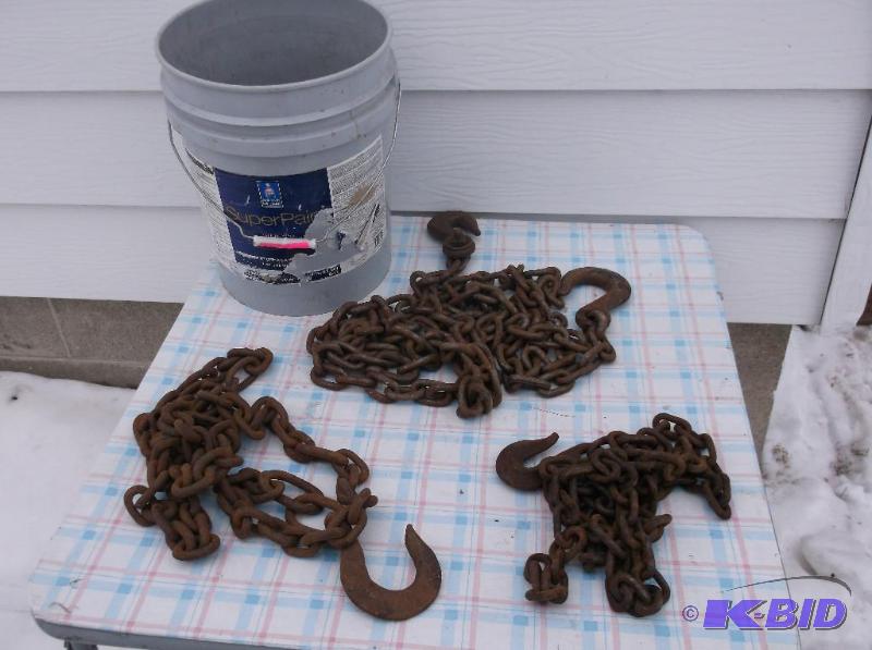 lot 18 image: 10 ft. Heavy duty chain with 2- 8ft pieces....