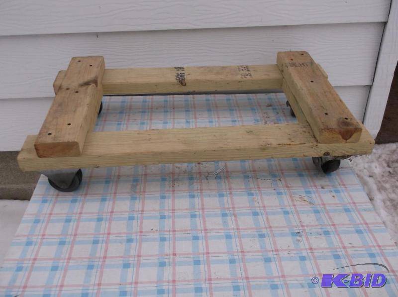 lot 32 image: Furniture cart on wheels....