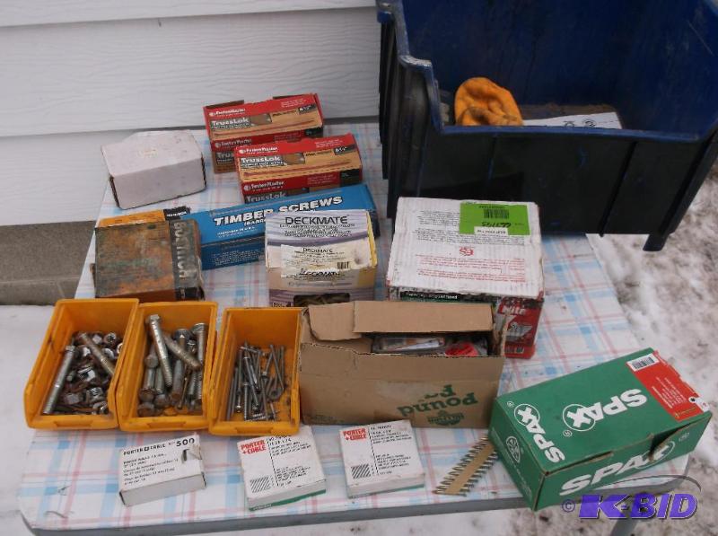 lot 35 image: Large bin of nail gun nails - deck screws - b...
