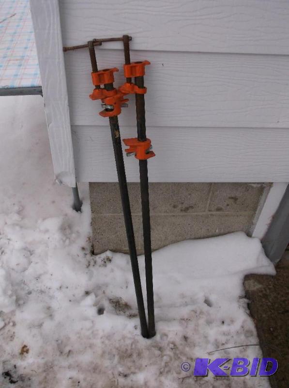 lot 38 image: 2 Pony 48" pipe wood clamps....