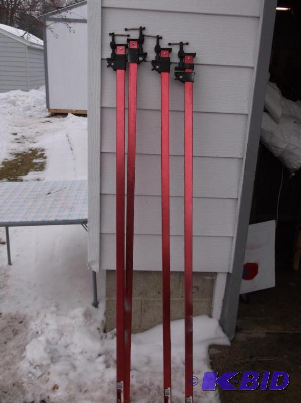 lot 39 image: 4- 60" aluminum Jet bar clamps....