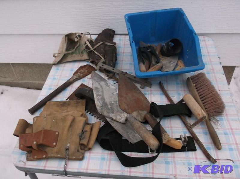 lot 46 image: Storage bin with cement tools and tool pouche...