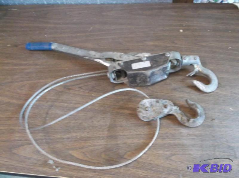 lot 6 image: Heavy duty cable hand wench.      ....