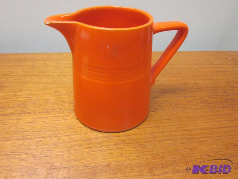 lot 112 image: 6 inch old Fiesta pitcher.  Radioactive ...