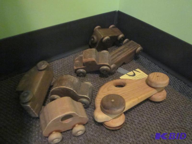 lot 186 image: Lot of (7) vintage solid wood toy cars.  &nbs...
