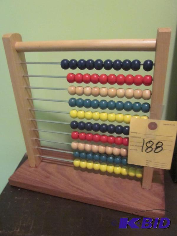 lot 188 image: Solid wood and metal standing abacus toy.&nbs...
