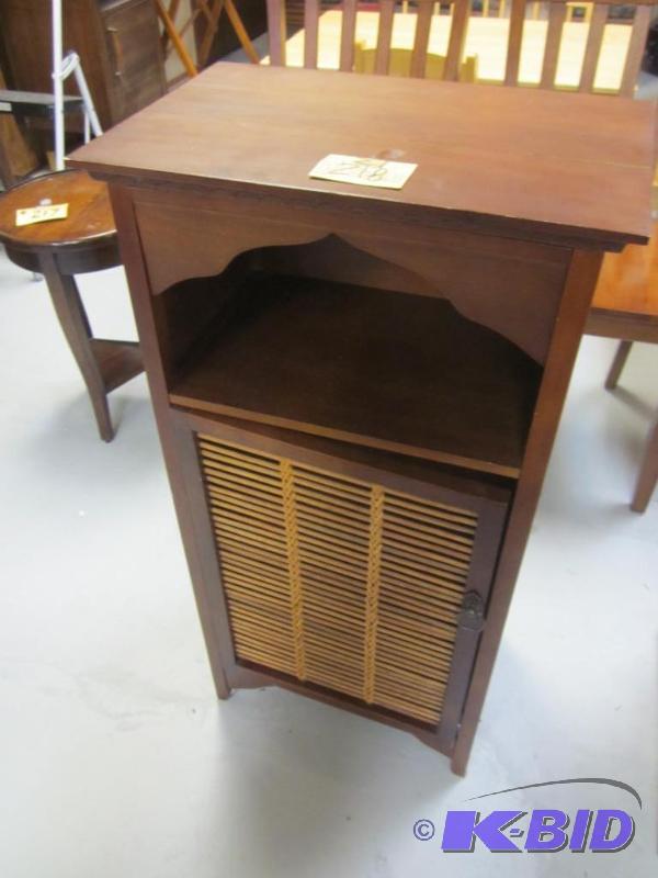 lot 218 image: Small wood utility storage cabinet.     ...