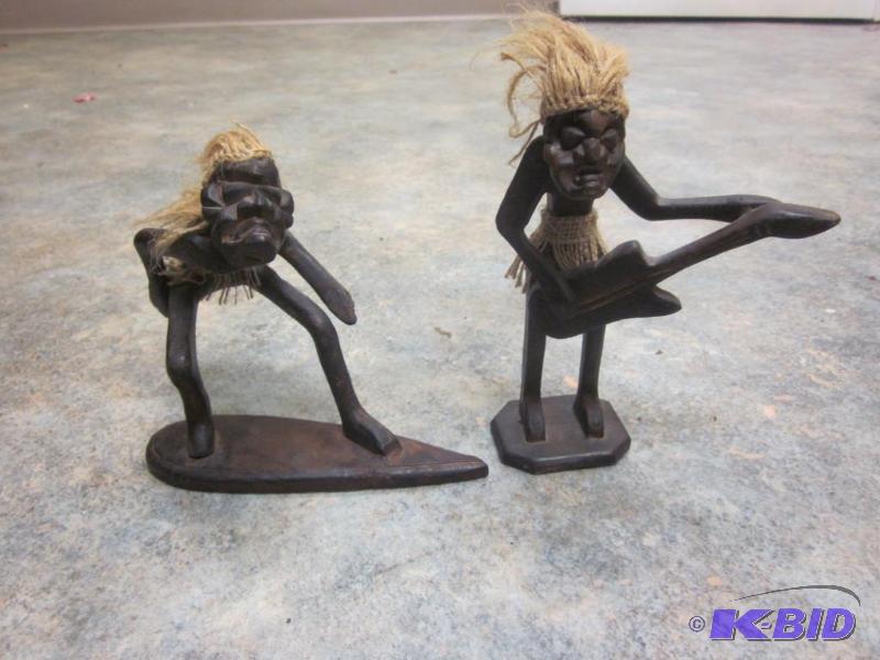 lot 233 image: Pair of 7 inch carved wood figures.     ...