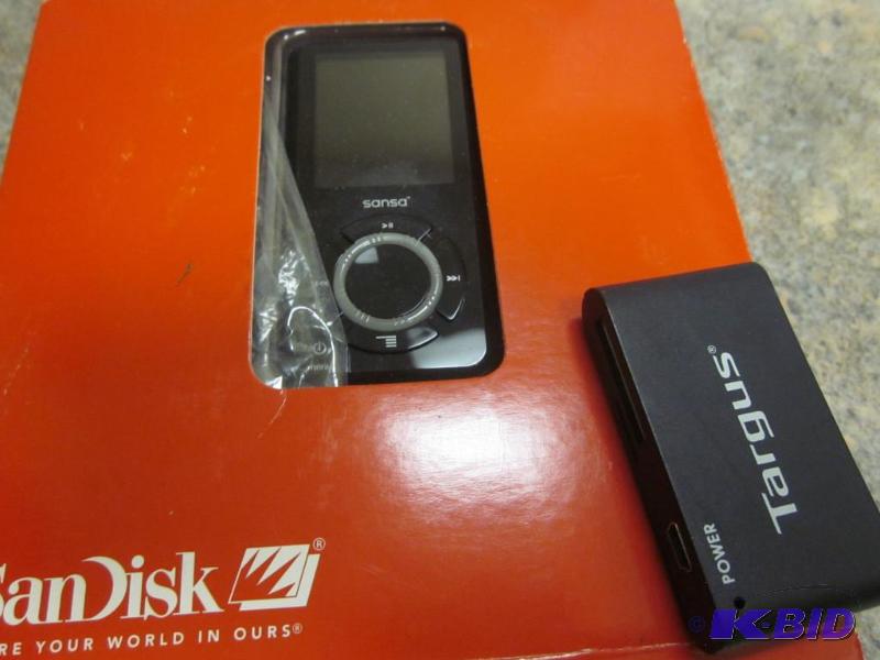 lot 249 image: San Disk MP3 player new in box with accessori...