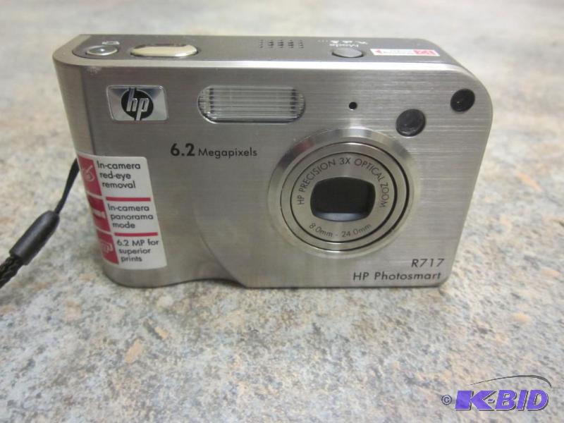 lot 250 image: HP Photosmart 8717 never used.  Has batt...