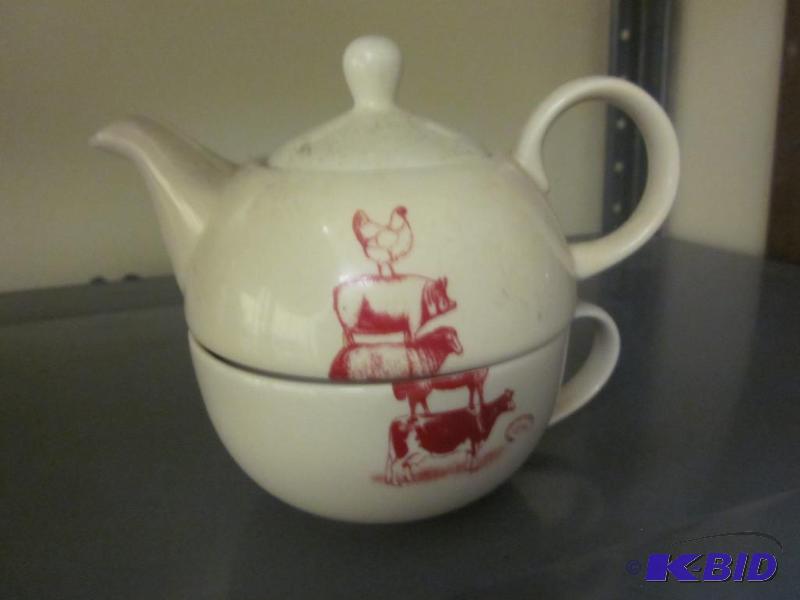 lot 263 image: Two part tea pot and cup.        &n...