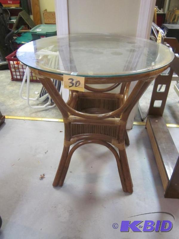 lot 30 image: Vintage 30 inch round wicker rattan glass to...