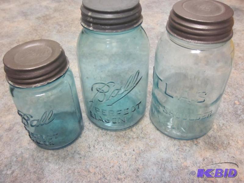 lot 315 image: Lot of (3) antique glass jars with lids.  &nb...