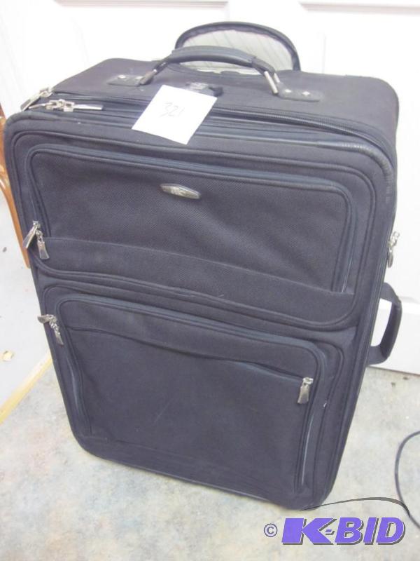 lot 321 image: Large suitcase, good and clean interior, one ...