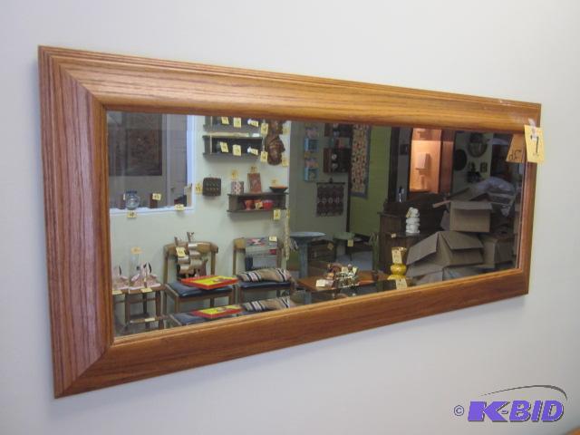 lot 7 image: 4 foot solid oak framed beveled glass mirror,...