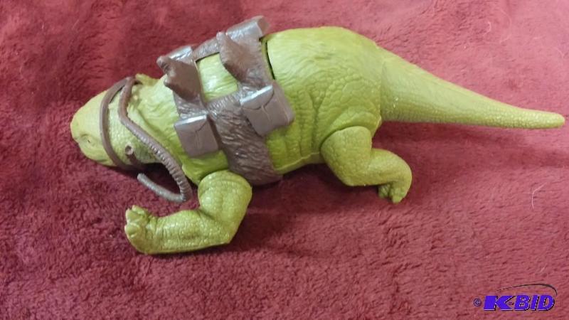 lot 109 image: VINTAGE DEWBACK COMPLETE THOUGH BRIDLE IS BRO...