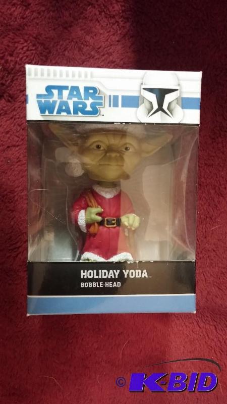 lot 110 image: STAR WARS HOLIDAY YODA BOBBLE HEAD NEVER BEEN...