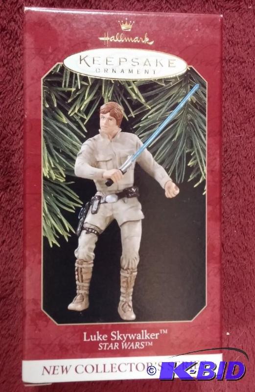 lot 142 image: HALLMARK ORNAMENT 1997 LUKE SKYWALKER NEVER B...