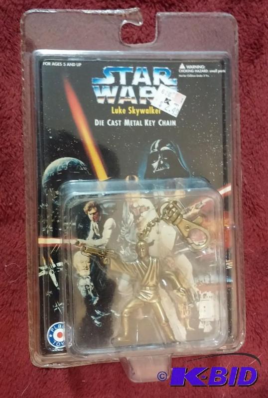 lot 173 image: STAR WARS LUKE SKYWALKER DIE CAST KEY CHAIN...