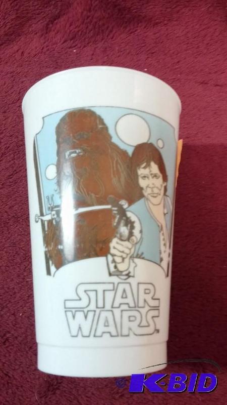 lot 42 image: VINTAGE COCA-COLA PLASTIC CUP FEATURING HAN S...