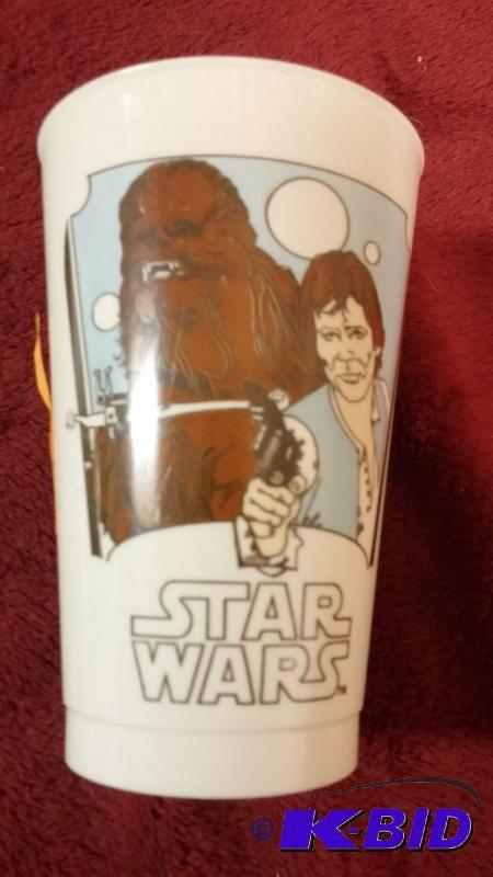 lot 60 image: VINTAGE COCA-COLA PLASTIC CUP FEATURING HAN S...