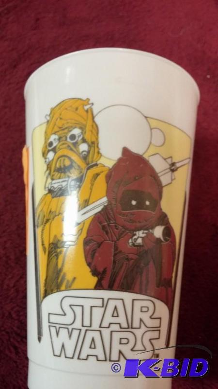 lot 61 image: VINTAGE COCA-COLA PLASTIC CUP FEATURING JAWA ...