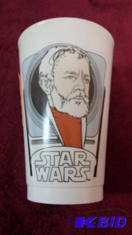 lot 63 image: VINTAGE COCA-COLA PLASTIC CUP FEATURING OBI-W...