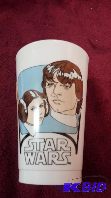 lot 64 image: VINTAGE COCA-COLA PLASTIC CUP FEATURING LUKE ...