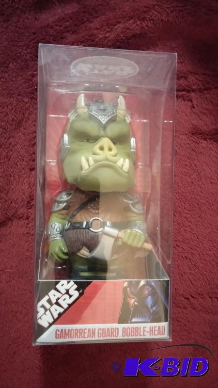 lot 76 image: GAMORREAN GUARD BOBBLE HEAD NEVER BEEN OPENED...