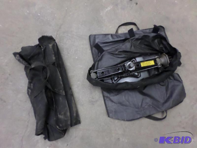 lot 105 image: (2) Roadside Jack Kits...