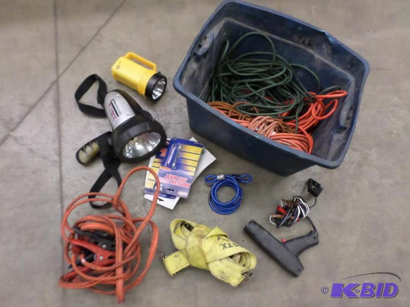 lot 36 image: Tote Of Cordless Lights, Jumper Cables, Exte...