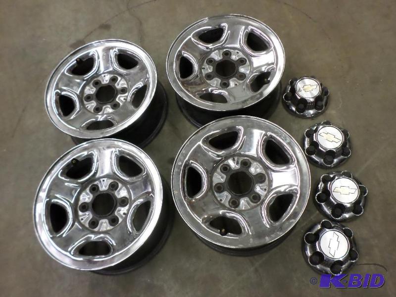 lot 51 image: (4) Chevy 8-Lug Chromed 16" Wheels With ...