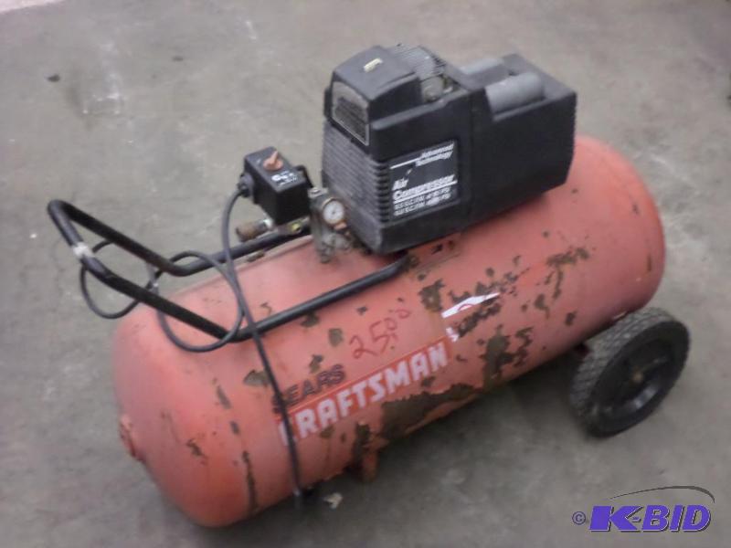 lot 61 image: Craftsman 20-Gallon Electric Air Compressor...
