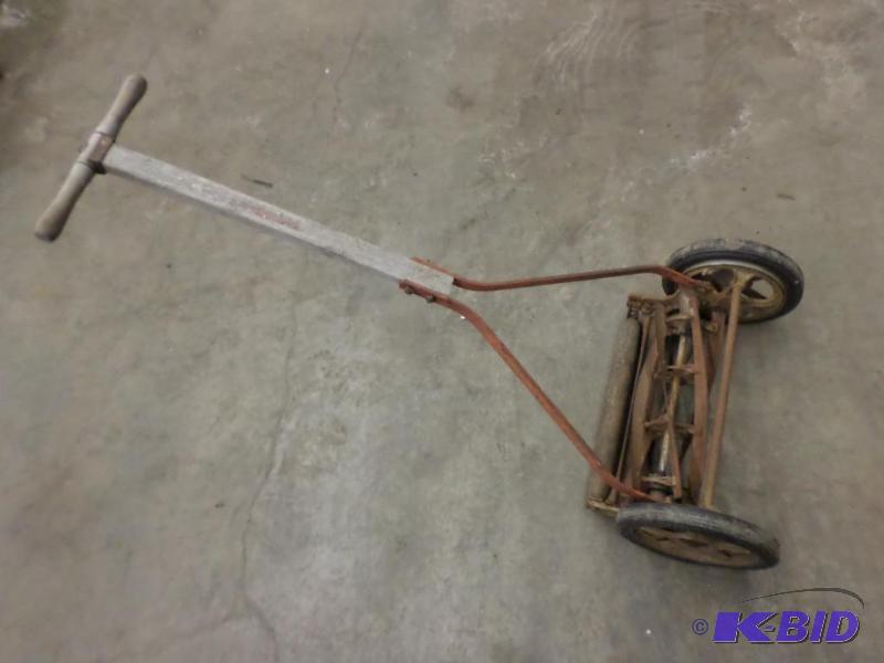 lot 63 image: Antique Reel Mower...